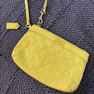 Coach neon yellow wristlet